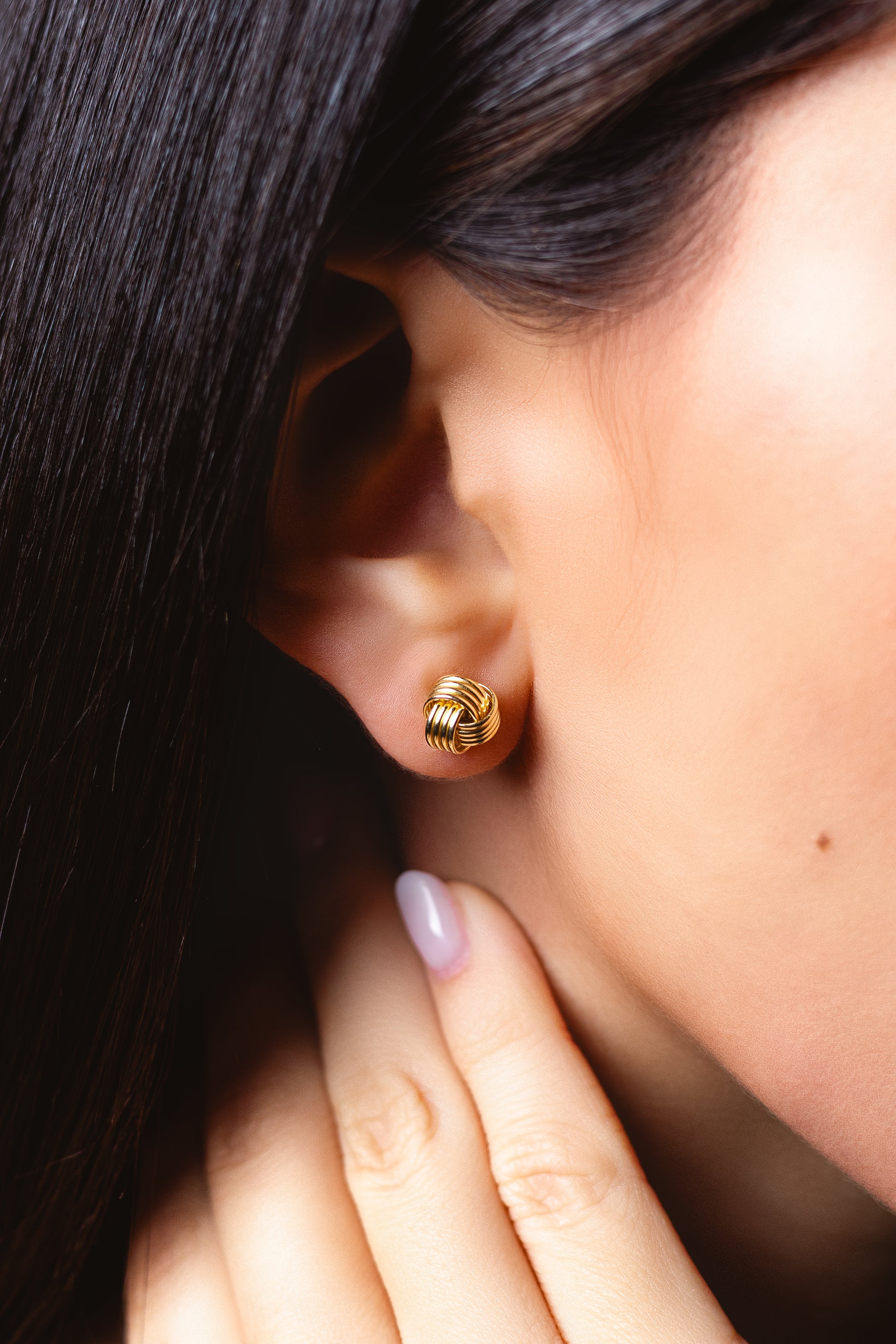 Aretes Nudo con Broche Mariposa - Oro Amarillo 10k
